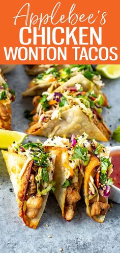 chicken wonton tacos on a plate with lime wedges