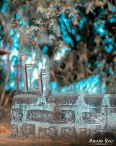 an old brick wall with blue lights in the background