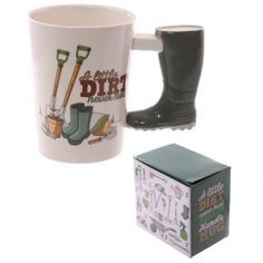 a coffee mug with a pair of rubber boots on it and a box for the boot