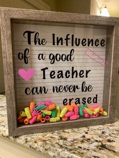 a sign that says the influence of a good teacher can never be erased