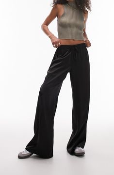 Silky satin never looked so good than these sweeping wide-leg trousers that offer lounge-like comfort in a sophisticated silhouette. 31" inseam; 13" leg opening; 12" front rise; 16" back rise (size 8) Drawstring waist Side-seam pockets 100% polyester Machine wash, line dry Imported Black Satin Pants Outfit Casual, Black Silk Pants Outfit, Satin Pants Outfit Casual, Black Satin Pants Outfit, Silk Pants Outfit, Satin Pants Outfit, Wide Leg Black Pants, Satin Wide Leg Pants, Nordstrom Outfit