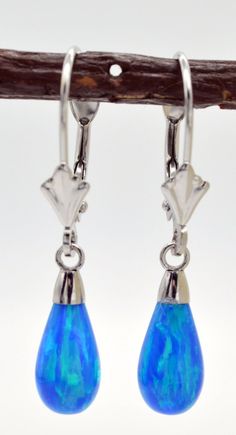 The shiny creation of these 14K Solid White Gold Tear Drop Blue Fire Opal Leverback Dangle Earrings can accentuate your impression and easy to seize people's eyes in the populace. It is suitable for birthdays, Valentine's Day, Christmas, Mother's Day, Anniversary, and so on. Specifications: Metal 14k Solid White Gold Style Opal Leverback Earrings Finish High Polished Earring Type Dangle (Drop) Gem Blue Opal Main Stone Shape Tear Drop Main Stone Creation Synthetic Fastening Leverback Stamp 14K He Blue Fire Opal, Earring Type, Leverback Earrings, Blue Fire, Fine Jewellery Earrings, Opal Earrings, Pretty Jewellery, Tear Drop, Blue Opal