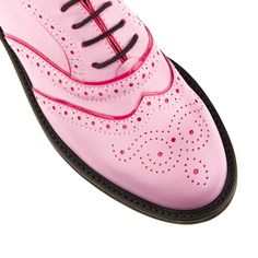 Forever classic, our Brick Lane women's Oxford shoes have all the traditional features, including punched holes, winged tips and contrasting leather and suede for a dash of extra style.  This women's designer shoe is leather lined for maximum comfort, and they are available in a range of colors including this cheery pink with dark pink patent leather trim.  Also, please note, our shoes are not made specifically for wide feet. We recommend cleaning our shoes with a soft bristle, horsehair brush or a lint-free cloth. If portions of the shoes have suede accents, we recommend spraying the suede with Embassy London's all natural Waterproofing Spray. Italian leather shoes will last a long time if cared for properly.  If your shoes  will be frequently exposed to the elements, it's a good idea to Couture, Oxfords Outfit, Women's Oxford Shoes, Pink Leather Shoes, Women Oxfords, Quirky Shoes, Designer Shoe, Pink Patent Leather, Italian Leather Shoes