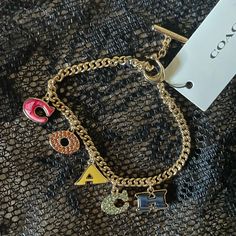 Plated Brass And Crystal Toggle Closure 7 1/4" (L) Coach Bracelets, Pretty Shoes Sneakers, Coach Jewelry, Gold Charm Bracelet, Jewelry Lookbook, Pandora Bracelets, Colorful Bracelets, Pretty Shoes, Dream Jewelry