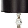 a table lamp with a black shade on it