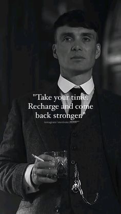 a man in a suit and tie holding a glass with a quote on it that reads, take your time recharge and creme back stronger