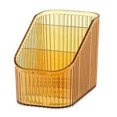 a yellow glass container with an angled design on the bottom and sides, sitting in front of a white background