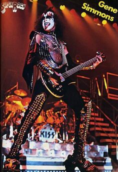 gene simmons on stage with his guitar