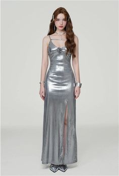 Radiate confidence in our Metallic Sheen Slip Dress, designed for a sleek and bold statement.
Made with a blend of polyester and spandex, this dress offers a comfortable fit with a touch of stretch, perfect for accentuating your silhouette. The thigh-high split adds a flirtatious edge to the elegant shape, while the subtle shimmer of the metallic fabric ensures you stand out in any setting.
Pair this slip dress with strappy heels for a glamorous evening look, or layer it with a tailored blazer f Silver Dress Long, Class Dress, Pose References, Metallic Fabric, Tailored Blazer, Maxi Gowns, Silver Dress, Urban Wear, Strappy Heels