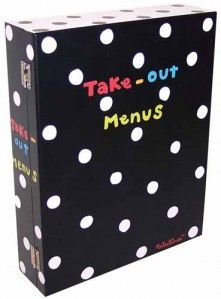 a black box with white polka dots and the words take out menus on it