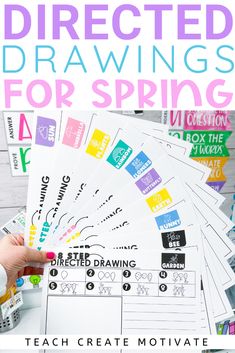 a person holding up some stickers with the words directed drawings for spring on them