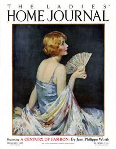 a woman in a blue dress holding a fan on the cover of a magazine called the ladies'home journal