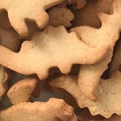 some cookies that have been cut in half and stacked on top of each other to look like animals