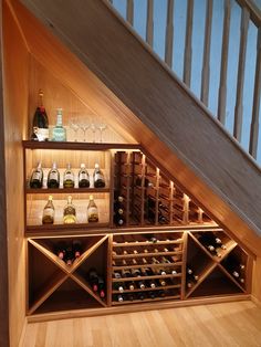 Understair wine rack Wine Bar Under Stairs Ideas, Staircase Wine Rack, Staircase Bar Under Stairs Wine Storage, Wine Cellar Below Stairs, Home Bar Wine Racks, Lockable Wine Storage, How To Build A Wine Cellar Under Stairs, Under Stairs Drinks Storage, Wine Storage Stairs