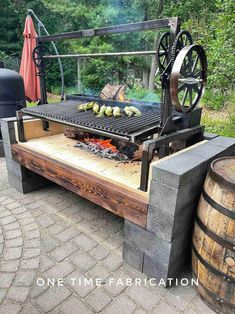 an outdoor bbq grill with lots of food on it