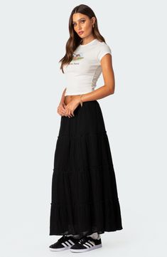 Breezy cotton adds summery allure to this low-rise tiered skirt cut at a flowy maxi length. 100% cotton Machine wash, dry flat Imported Black Tiered Skirt Outfit, Black Flowy Skirt Outfit, Aline Skirt Outfit, Long Flowy Skirt Outfit, Tiered Maxi Skirt Outfit, Black Long Skirt Outfit, Tiered Skirt Outfit, Black Boho Skirt, Flowy Skirt Outfit