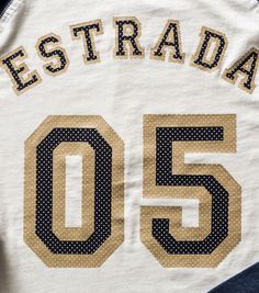 a baseball jersey with the number fifty five printed on it