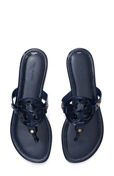 Known for its supple leather, iconic branding and lightly cushioned footbed, the original Miller sandal is a timeless favorite. Cushioned footbed Leather upper and lining/rubber sole Imported Tory Burch, Miller Sandal, Tory Burch Miller, Cadillac Escalade, Tory Burch Miller Sandal, Sandal Women, Cadillac, Rubber Sole, Womens Sandals