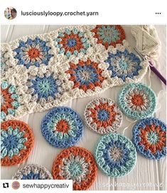 several crocheted circles sitting on top of a table