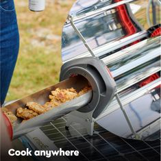 a person is cooking food on an outdoor grill with the words cook anywhere above it