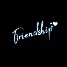 a neon sign that says friendship in white writing on a black background with hearts