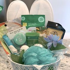 a basket filled with personal care items on top of a counter