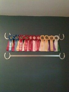 there are many ribbons hanging on the wall