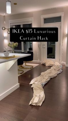 an image of a very large living room with the words ikea $ 15 luxurious curtain hack