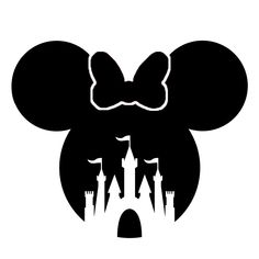 the silhouette of mickey mouse's head in front of a castle with a bow