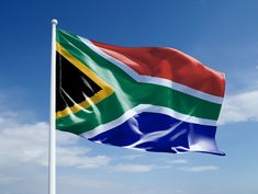 the flag of south africa is waving in the wind