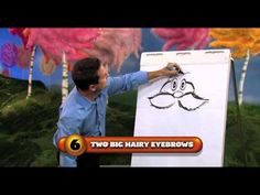 a man is drawing on a whiteboard with the words two big hairy eyebrows in front of him