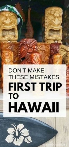 some carved wooden tiki heads with the words don't make these mistakes first trip to hawaii