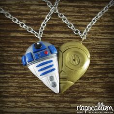 two star wars necklaces one has a r2d2 and the other is a heart