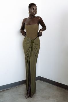 You'll be the epitome of style when wearing our Olive Fenix Reversible Linen Corset. This eye catching corset showcases a strapless neckline with boning throughout the front and back for added structure and support. Crafted in a Cotton/Linen blend... Summer Skirts And Dresses, Dark Green Long Skirt Outfit, Wedding Guest Dress Unique, Linen Clothing Aesthetic, Bra As Top Outfit, Corset Two Piece Outfit, Top And Skirt Outfit Party, Dressy Casual Outfits Black Women, How To Wear A Maxi Skirt