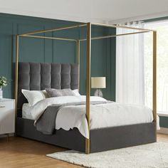 a bedroom with a bed, nightstand and mirror