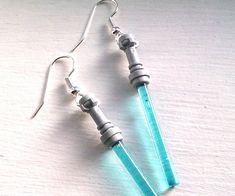 the earrings are made out of glass and have metal fittings on each ear wire