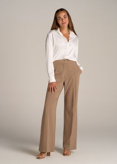 About Our Flat Front Wide Leg Dress Pants for Tall Women Ultra-flattering and easy to wear, these women's tall dress pants are a closet essential. They feature a smooth front with a contoured waistband for a complimentary finish. Pleated accents at the front and back elongate your legs and make them easy to wear from the desk to dinner. Built with a stretch-infused polyester-viscose blend, these pants for tall women offer the sleek feel of a suit with the comfort of a lounge pant. An elastic at Caqui Pants, Womens Tall Dress Pants, Pants For Tall Women, Meeting Outfits, Dress Slacks For Women, Slacks Outfit, Meeting Outfit, Tall Dress, Cream Pants