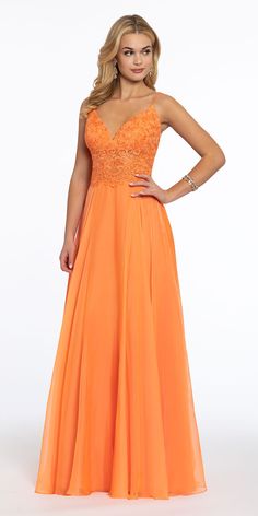 Be bold this prom season in an illusion long prom dress! This bright beauty features a V-neck and double spaghetti straps, with floral appliqué detail on the bodice and a light, airy chiffon skirt. The perfect silhouette for spring, this look pairs well with low strappy rhinestone sandals and a pleated clutch. #CamilleLaVie Prom 2020, Rhinestone Sandals, Prom Looks, Color Fabric