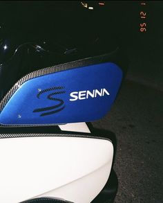 there is a blue seat on the back of a motorcycle