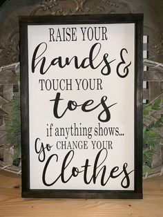 a sign that says raise your hands and touch your toes if anything shows go change your clothes