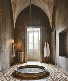 a bathtub in the middle of a room