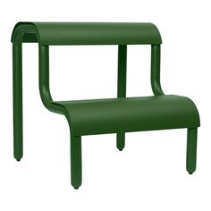 a green plastic bench sitting on top of a white background