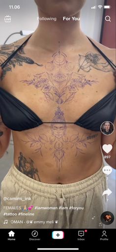 a woman with tattoos on her stomach and chest is shown in an instagramtion screen