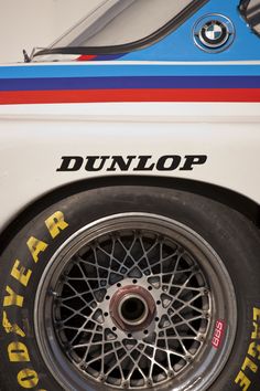 the front wheel of an old race car