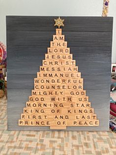 a christmas tree made out of scrabble tiles