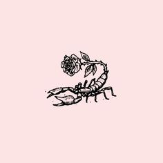 a drawing of a scorpion with flowers on it's back and the word love written in