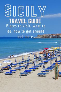 the beach with blue umbrellas and people on it is featured in this travel guide