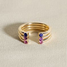 Elegant, colorful, and designed for your every mood. This delicate 10K yellow gold open cuff ring, from the Juliette Maison™ collection, is personalized with two dazzling natural amethyst gemstones. Bonus: because it’s a cuff, it stacks easily with all your favorite rings. Open Cuff Ring, Diamond Solitaire Earrings, Gold Book, Jared The Galleria Of Jewelry, Cuff Ring, Cuff Rings, Peridot Gemstone, Aquamarine Stone, Rhodolite Garnet