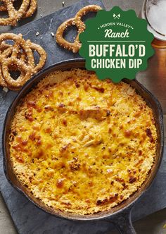 the cover of buffalo'd chicken dip with pretzels and pretzel rings