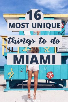 a woman standing in front of a blue lifeguard tower with the words 16 most unique things to do in miami